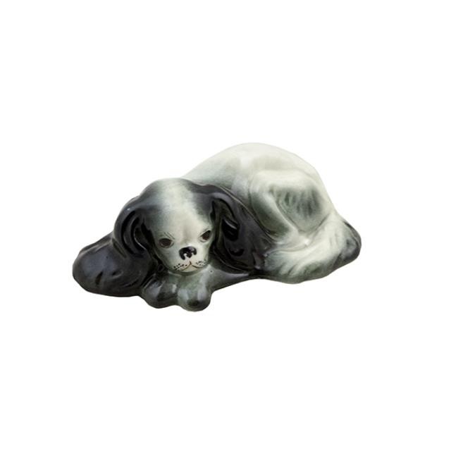 FIGURINE-DOG LAYING/Black & White Cocker Spaniel