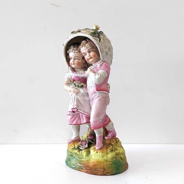 FIGURINE-Boy & Girl Dressed in Pink w/Basket on Heads